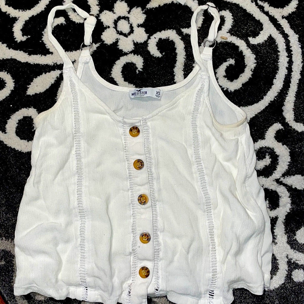 Flowy tank top with rectangle pattern and buttons going down front
